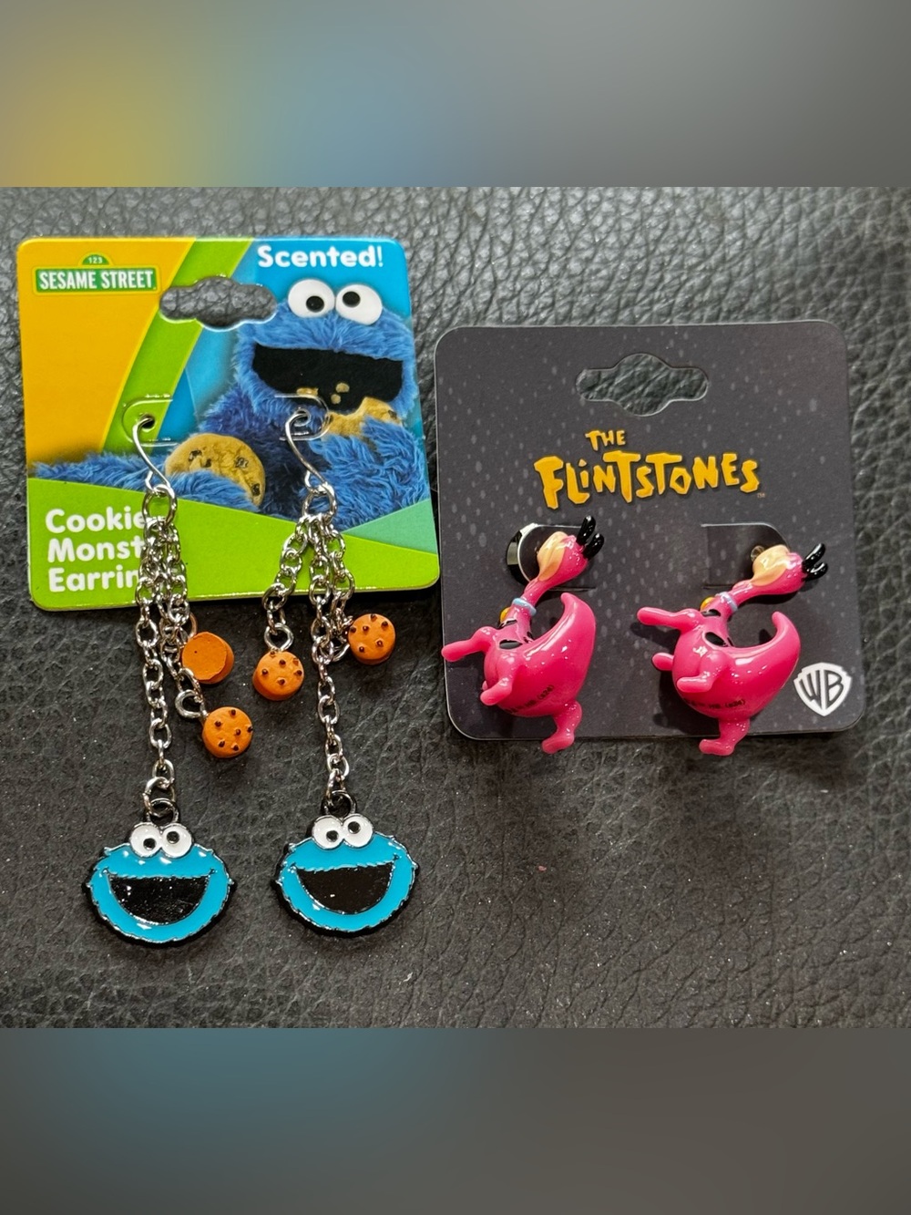 NWT Set of 2 sesame Street, Cookie Monster earrings, Flintstones Dino earrings